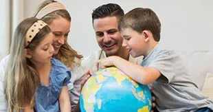 In what way does a native speaker teach a child perfect English?